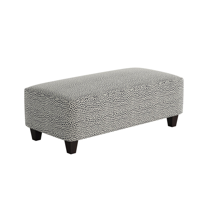 Southern Home Furnishings - Faux Skin Carbon 49"Cocktail Ottoman in Black - 100-C Faux Skin Carbon